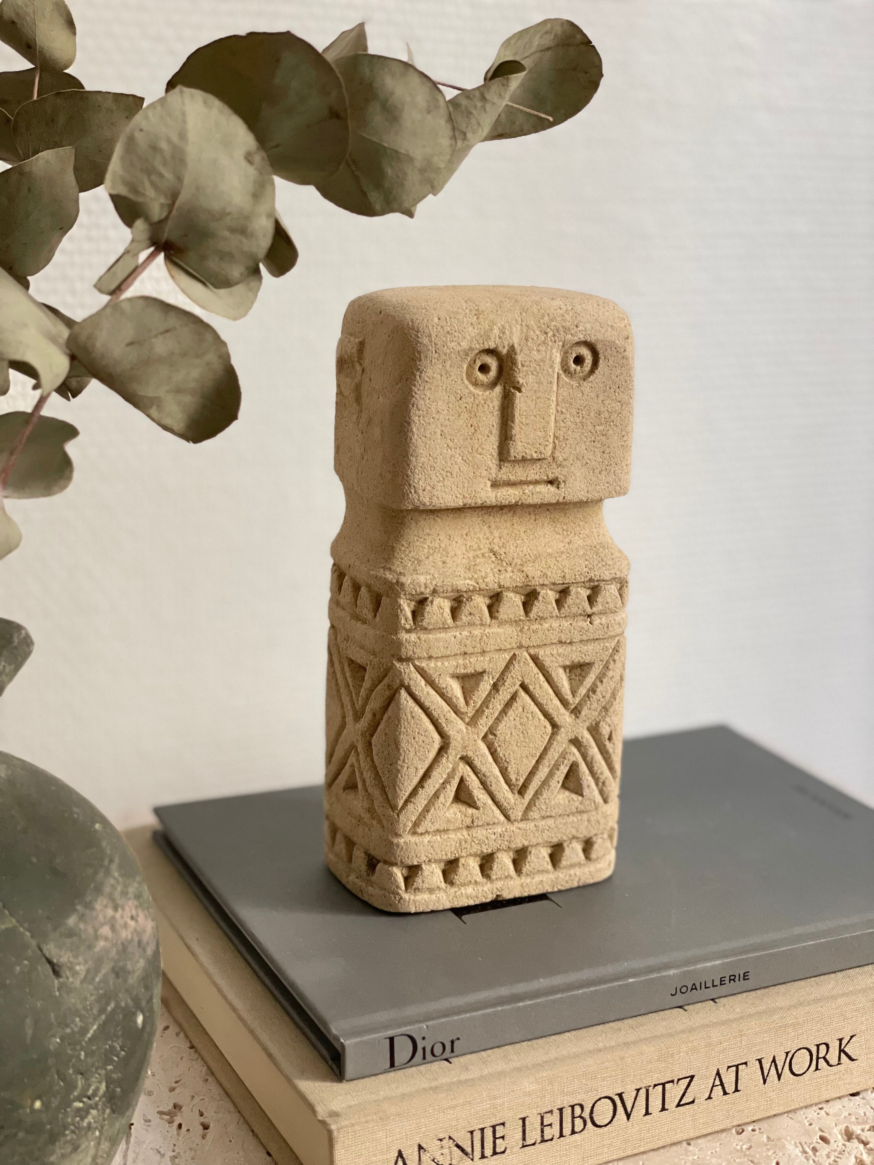 minimalist stone faces