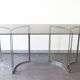 Smoked glass console with chrome legs, 1970.