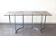 Smoked glass console with chrome legs, 1970.