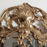 Antique mirror in gilded metal