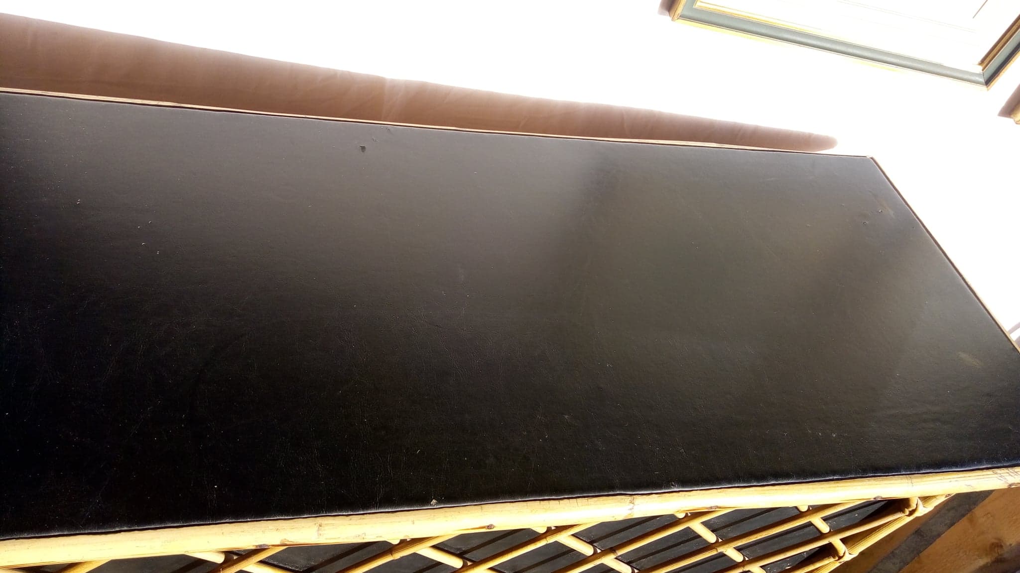 Bar in rattan, bamboo and faux black leather