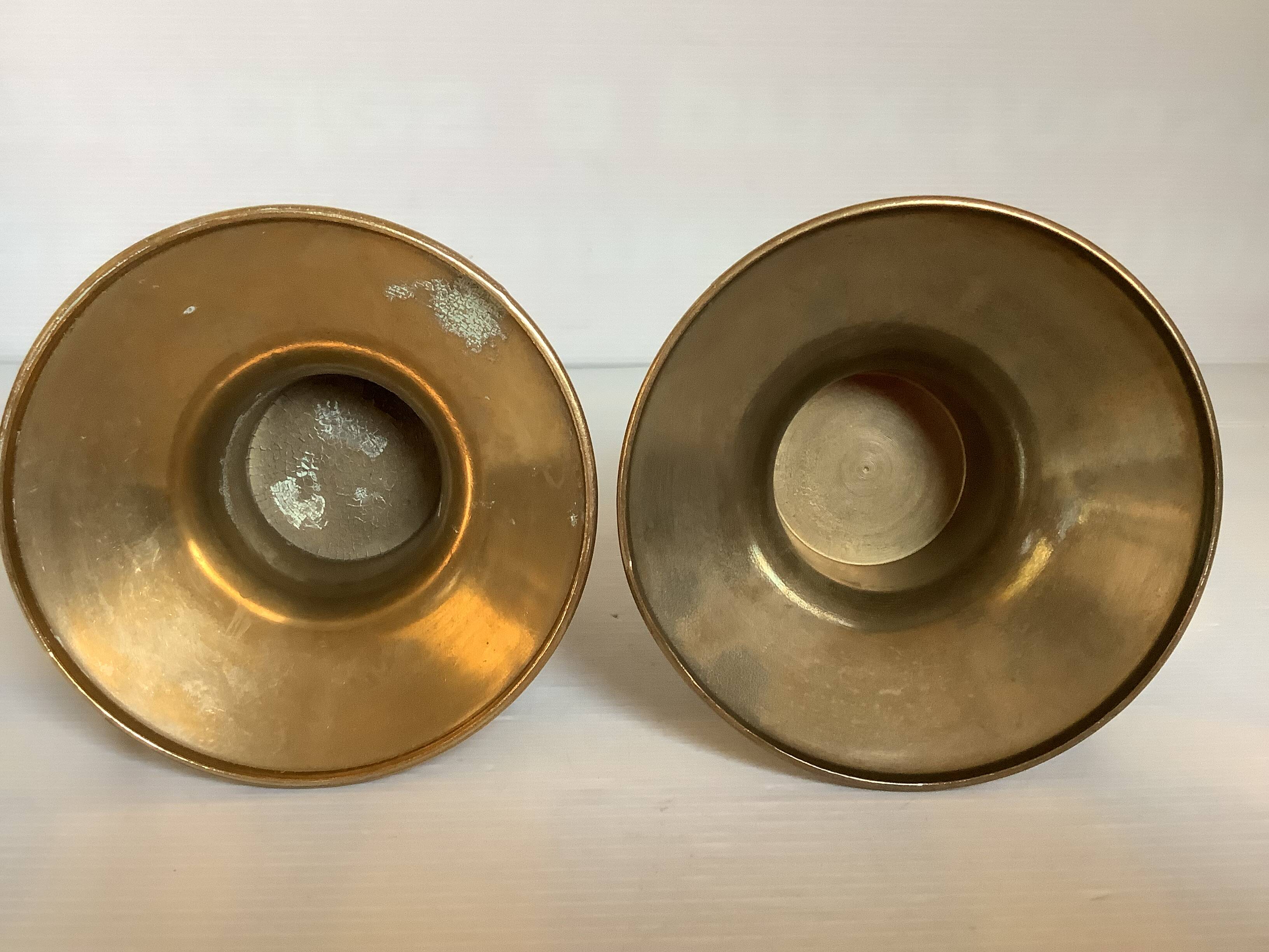 Pair of rat cave candlesticks with tulip base in bronze.