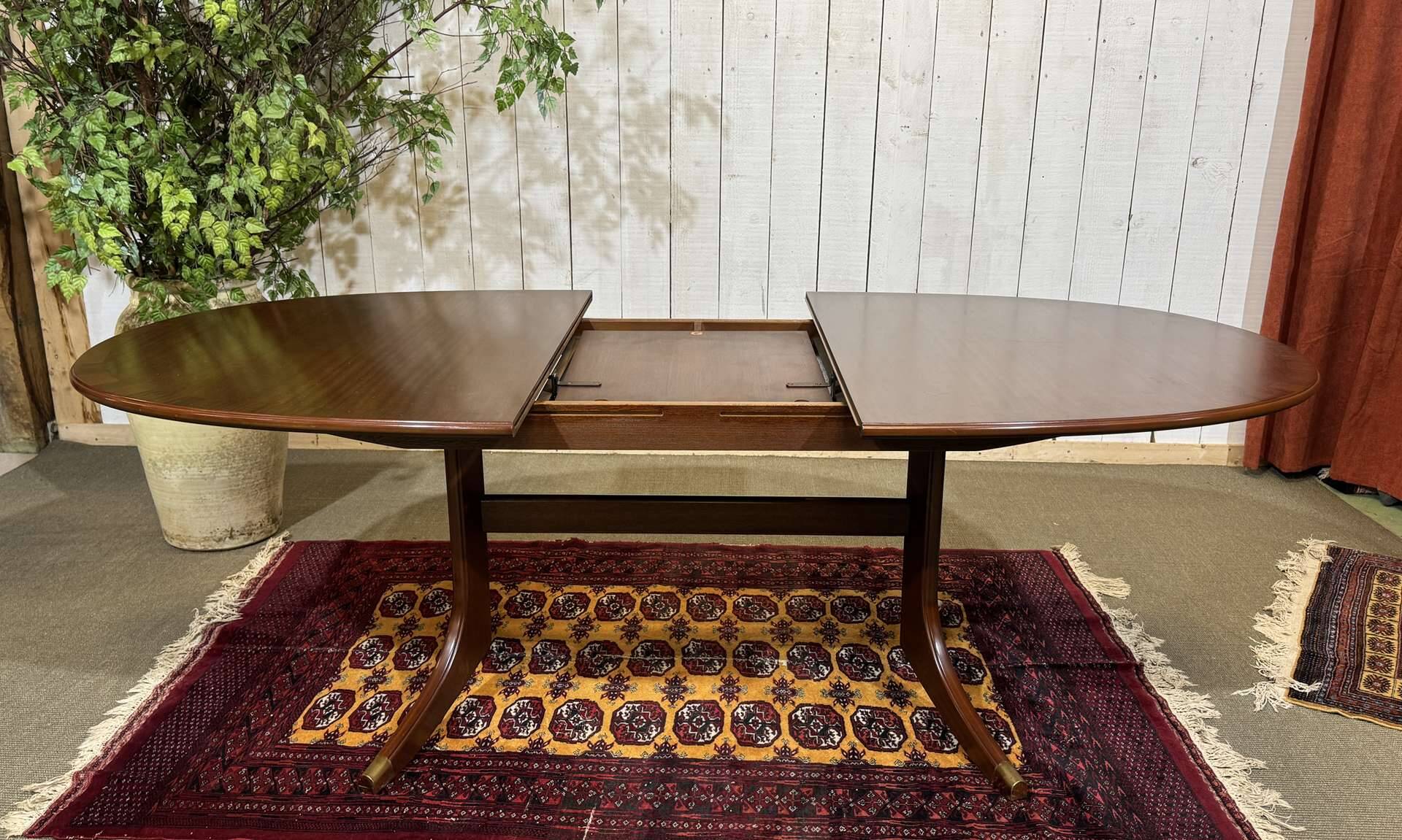 Oval GPlan table in mahogany from the 1970s with a butterfly extension.