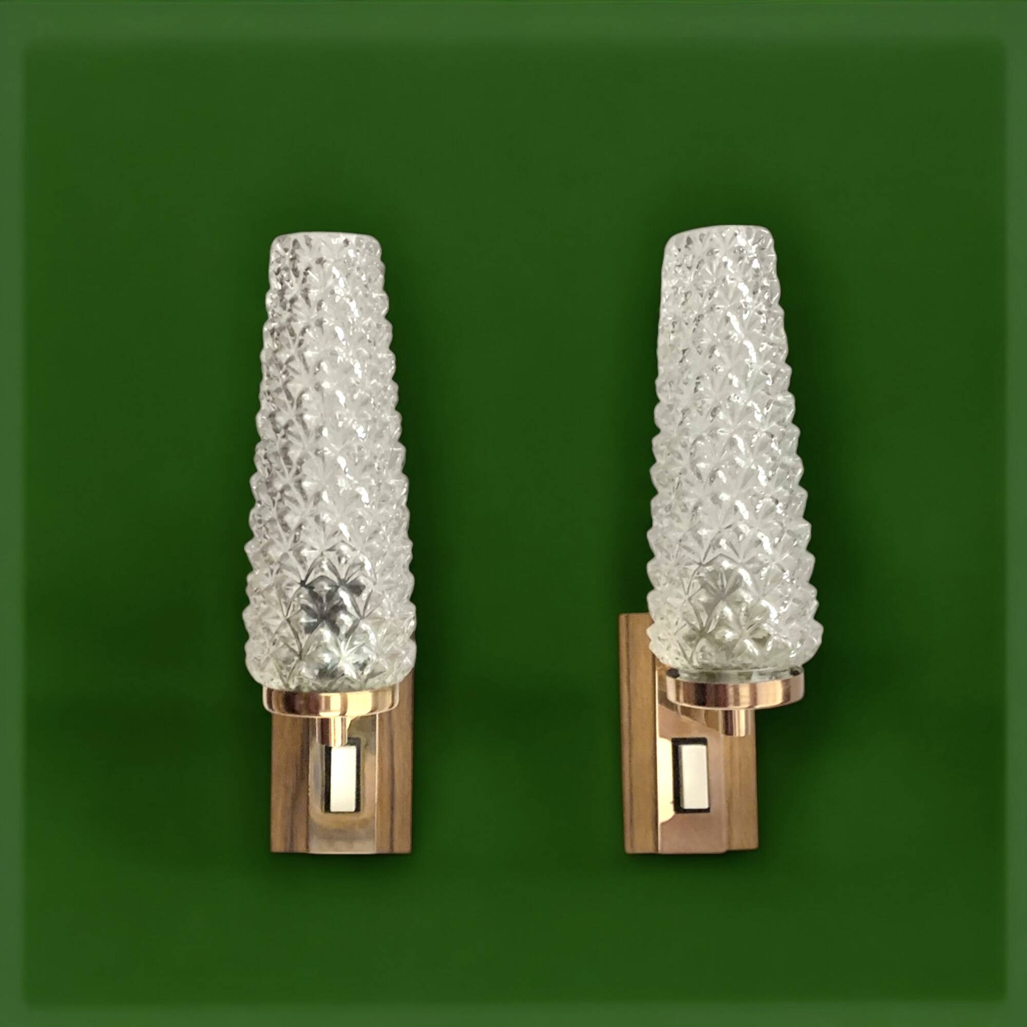 Pair of vintage wall sconces in molded glass and gilded brass