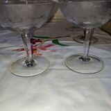 Beautiful set of seven crystal champagne glasses engraved with vine branches