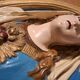 Vintage plaster frame of the Virgin, old religious painting