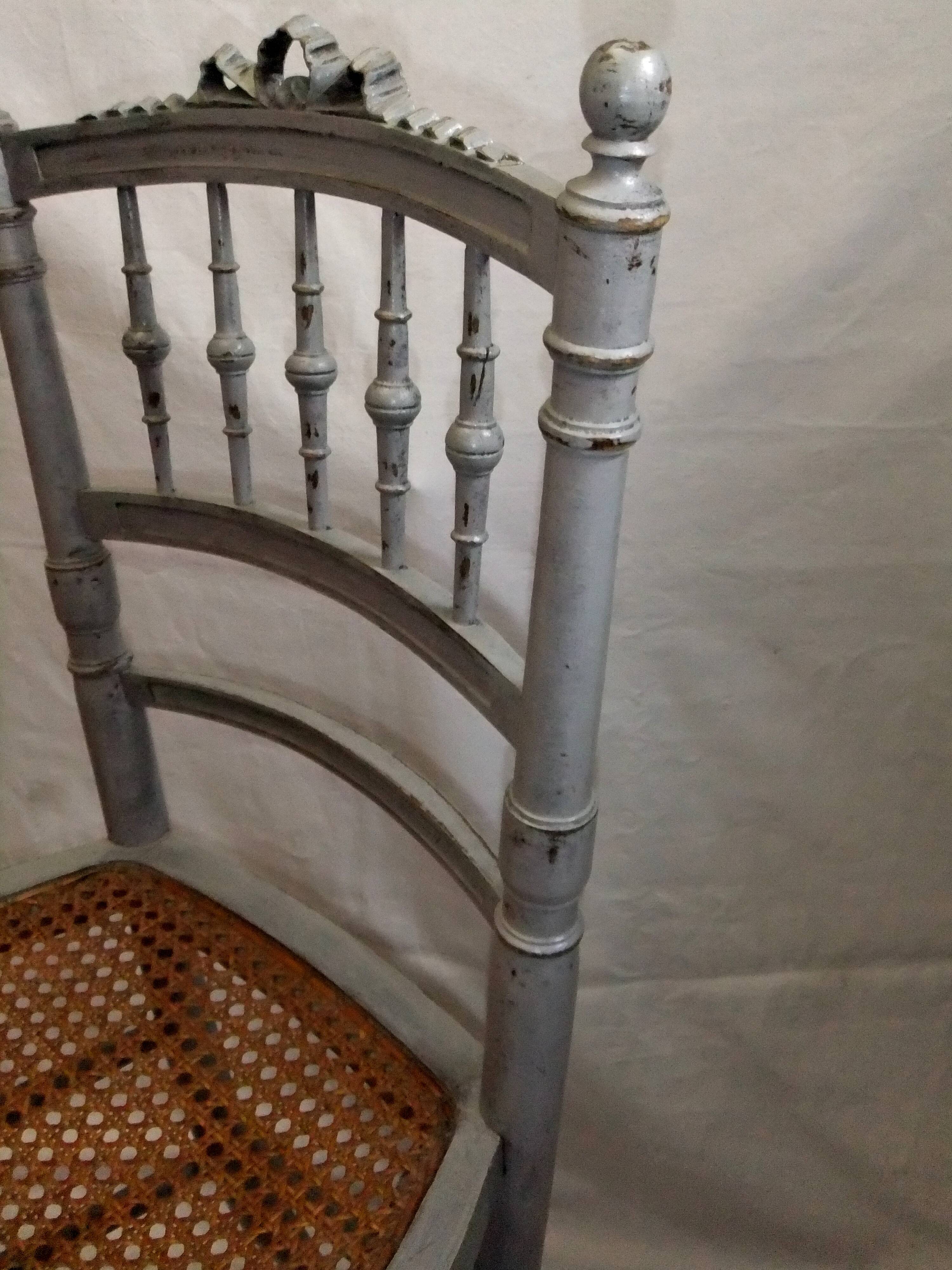 Antique Louis XVI style chair with pebble grey cane