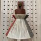 Scandinavian design wall light in teak and brass from the 1950s.