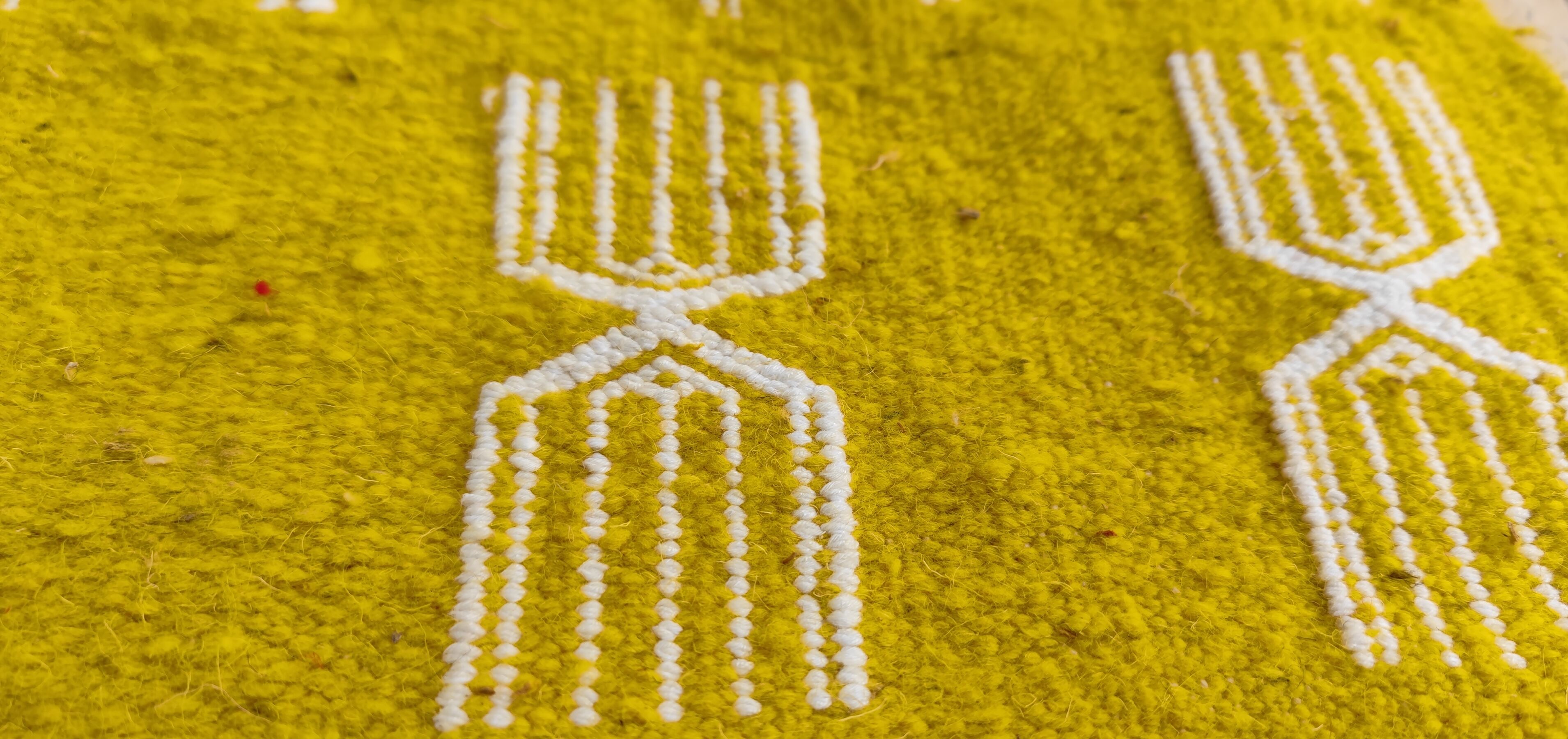 Hand-woven yellow and white kilim rug in natural wool