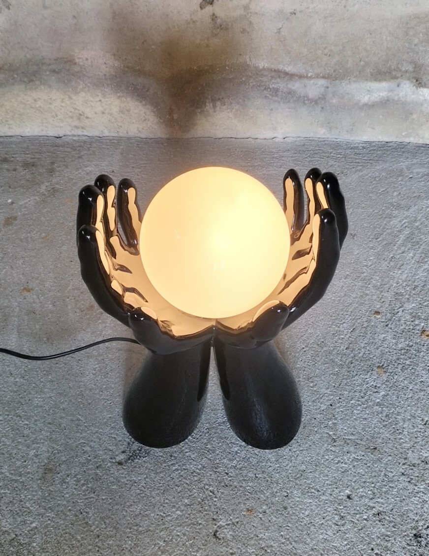 Black and white opaline hand lamp.