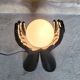 Black and white opaline hand lamp.
