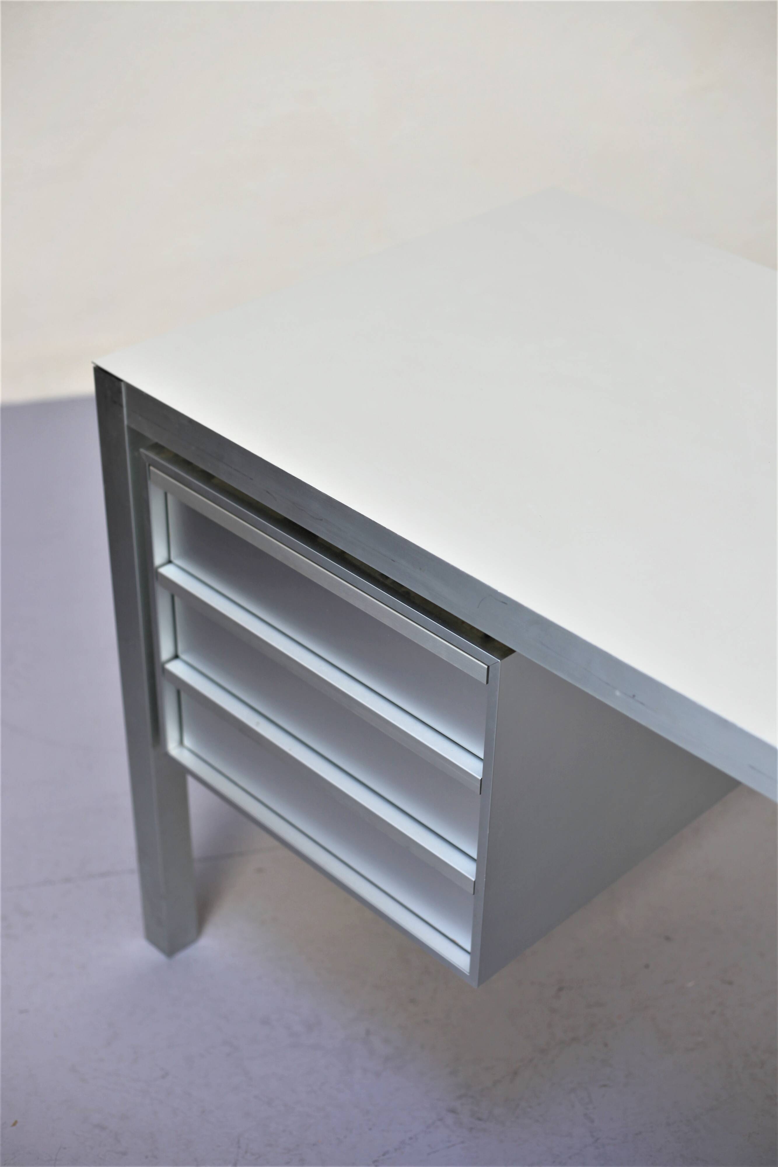 Brushed aluminum desk by MDF Italia