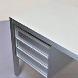Brushed aluminum desk by MDF Italia