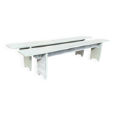Pair of wooden benches painted white, French artisanal work.
