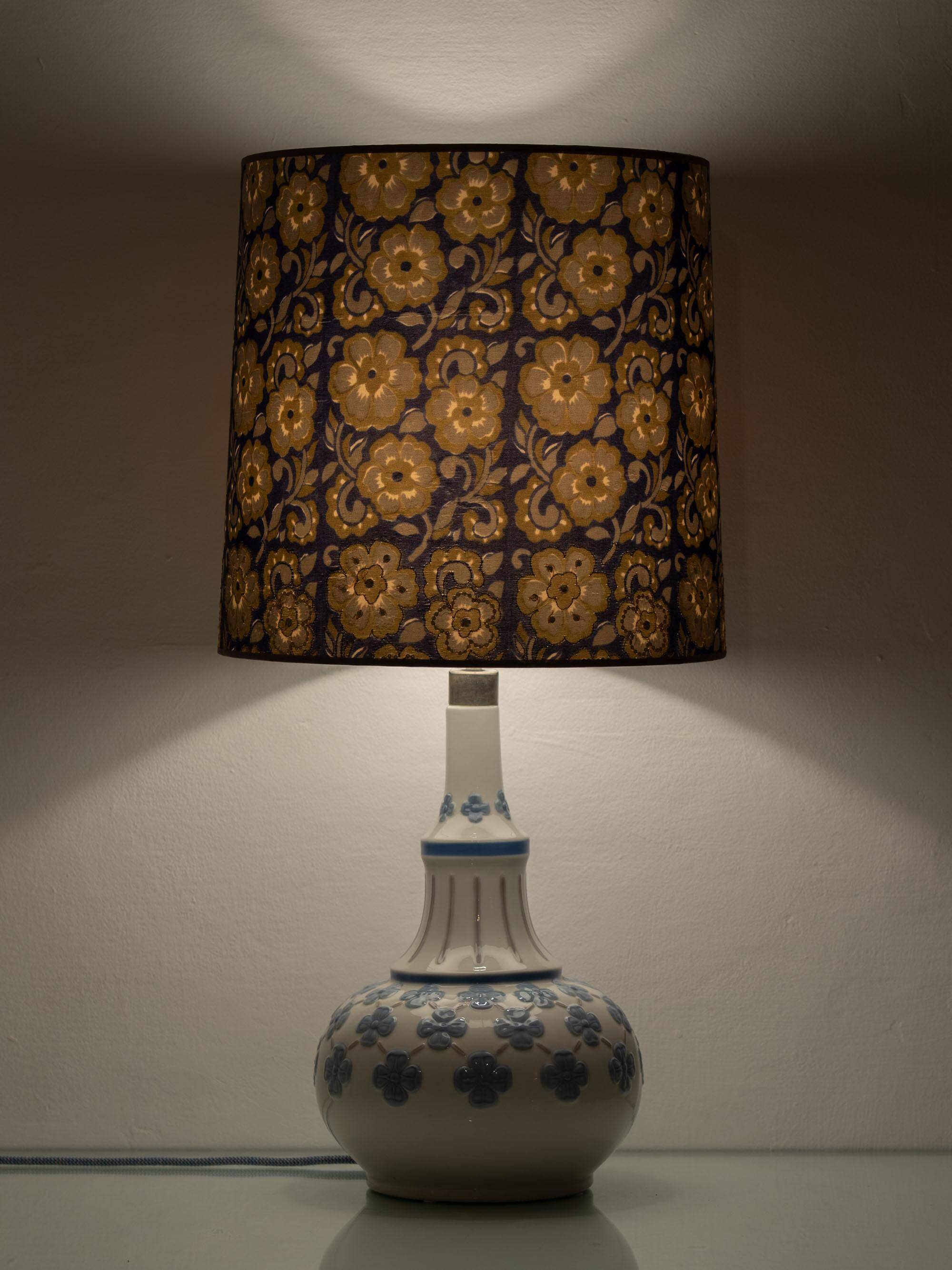 Blue and white porcelain table lamp by Lladró with floral shade in new silk.