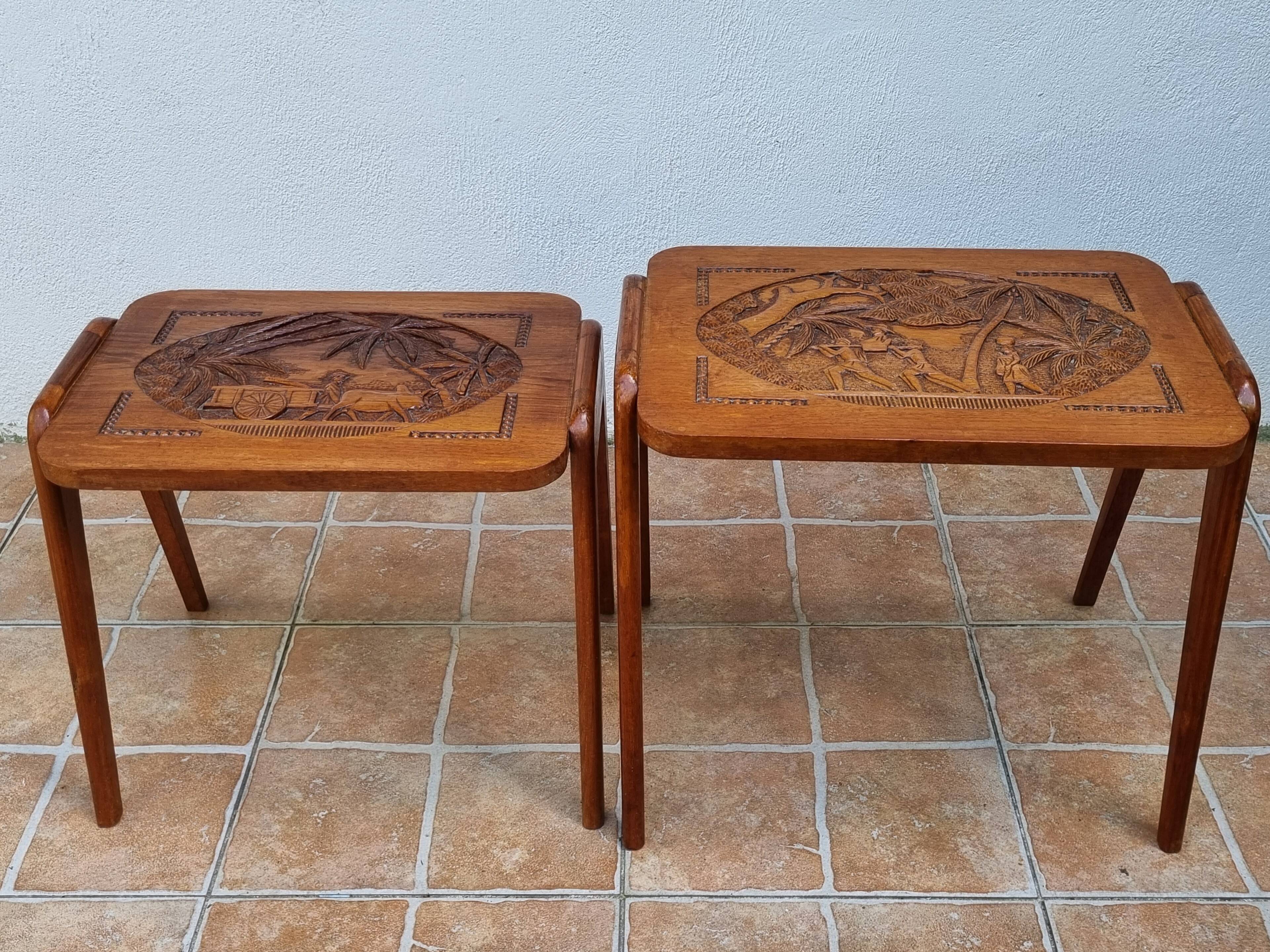 Pair of Malagasy nesting tables in carved wood, signed, m.o.f, 1955