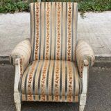 2 Louis XVI bergère armchairs in solid wood with beige and blue embroidered fabric.