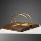 Vintage Gucci bookends in leather and brass, Italy, 1970s.