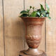 Copper vase hammered on pedestal