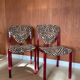 4 red lacquered zebra chairs