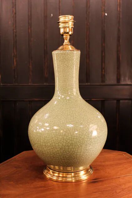 Ceramic lamp with a crackled celadon green finish.
