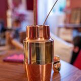 Copper vase forms a shaker