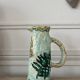Antique handcrafted ceramic pitcher