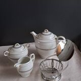 Teapot, sugar bowl, milk jug, jam jar.