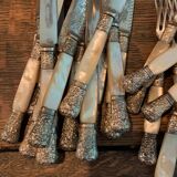 Set of coat of arms fruit cutlery