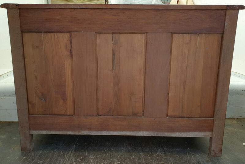 Crossbow chest of drawers with caramel patina