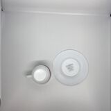 Small coffee cups with saucers