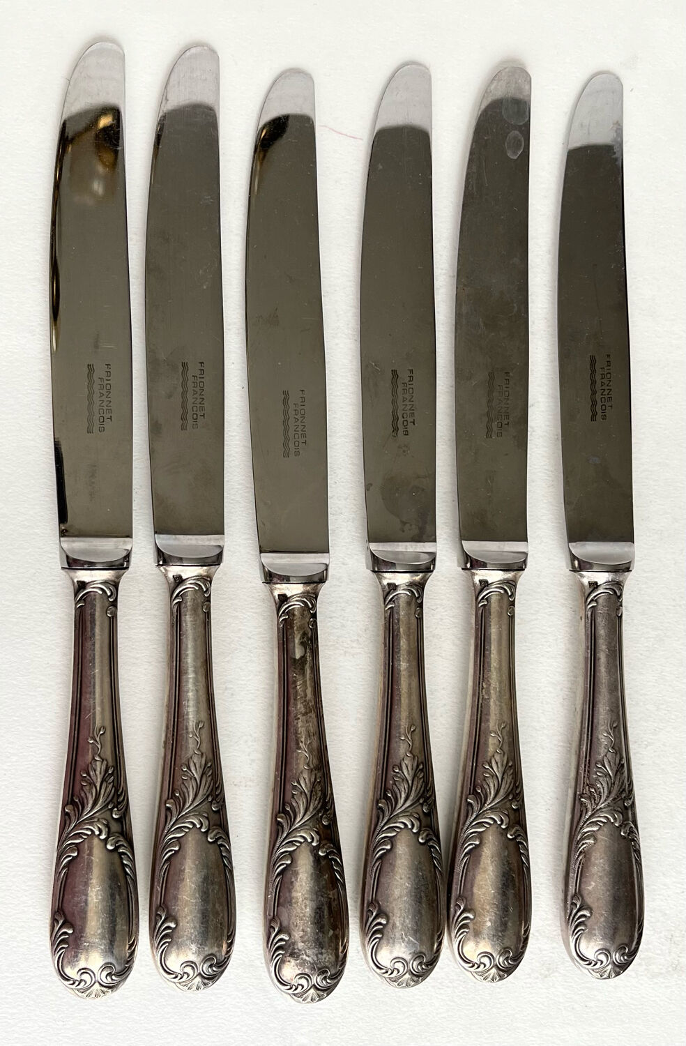 6 silver metal knives
