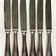6 silver metal knives
