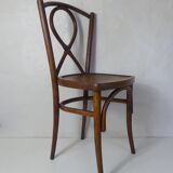 Old curved wooden bistro chair