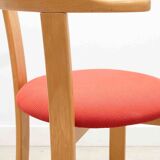 Chair upholstered in red and beech