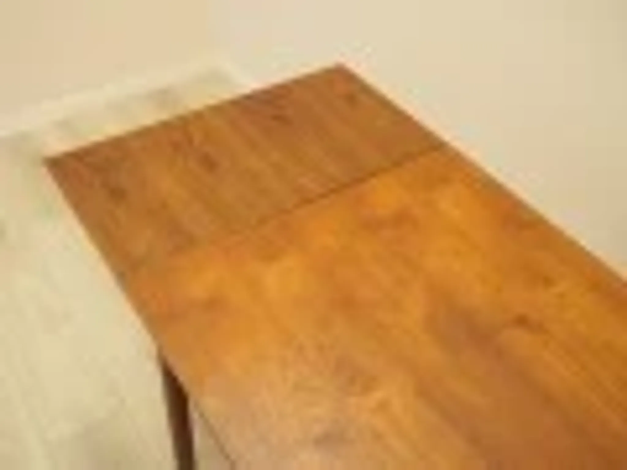 Danish teak extending dining table on solid wood legs, 1970s
