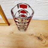 Glass vase with colored facets