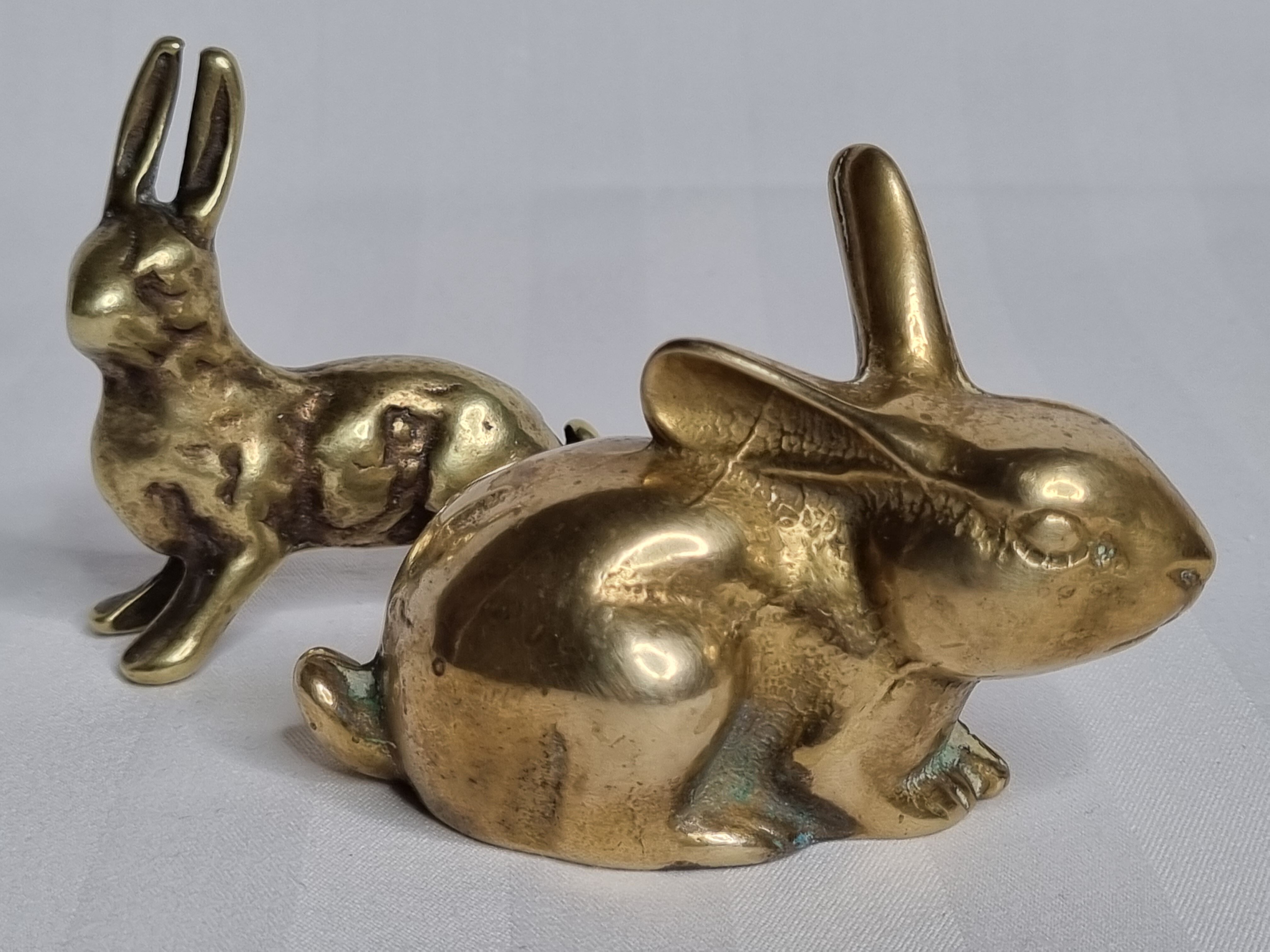 Duo of rabbit and hare in ancient bronze