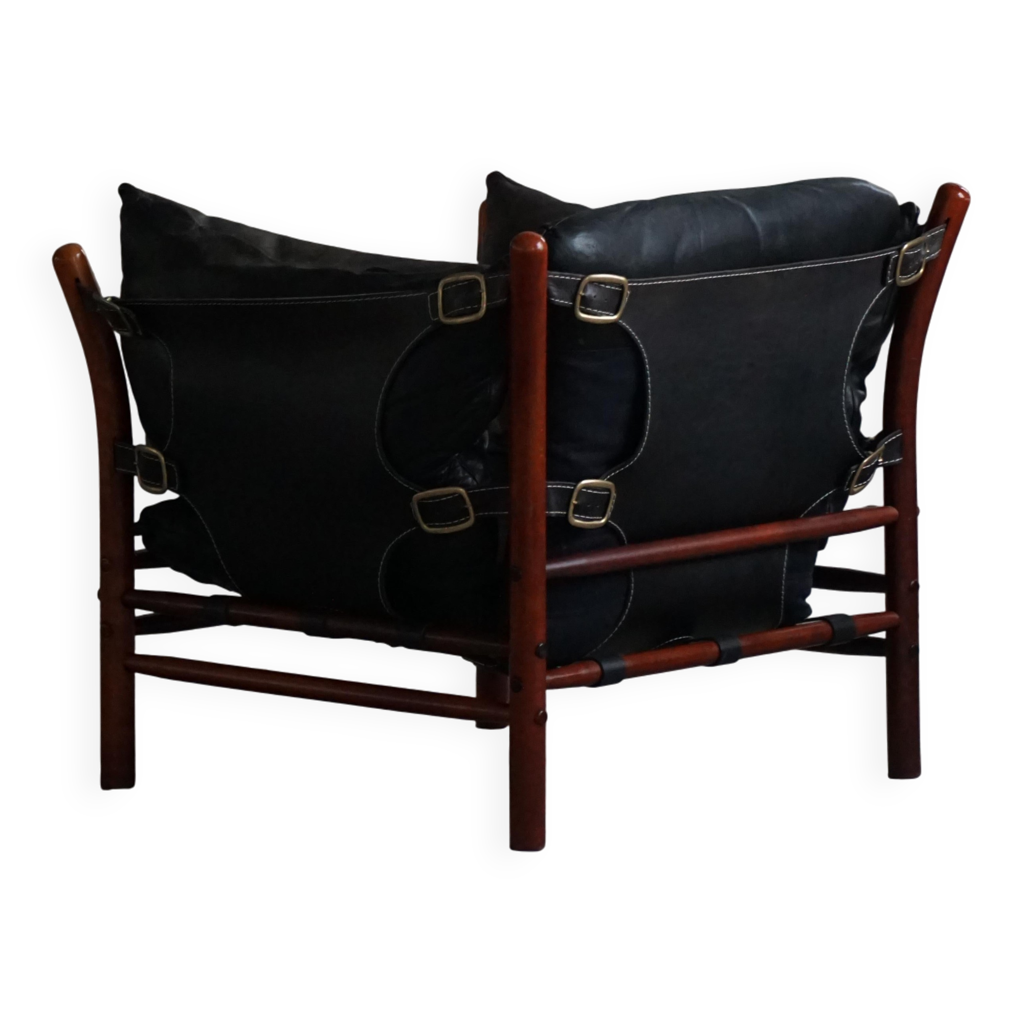 "Lounge chair 'Ilona' by Arne Norell in stained beech and leather, mid-20th century."