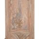 Paneled and carved wooden cupboard door