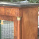 A small piece of Bonheur du jour with detached columns in Empire-era mahogany.