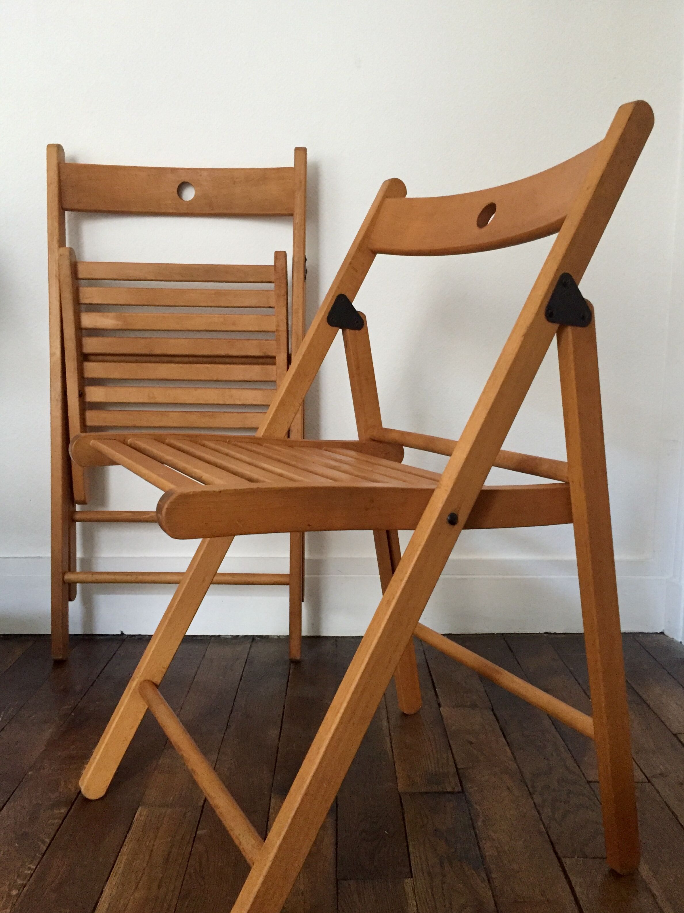 2 folding wooden chairs