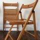2 folding wooden chairs