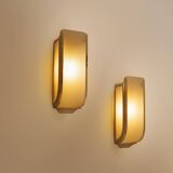 Pair of modernist wall sconces in nickel-plated steel and opaline glass, 1930.