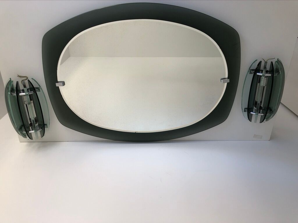 Veca mirror and 2 matching Veca wall lights made in Italy.
