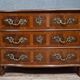 Curved commode from the Louis XIV period in marquetry - adorned with gilded bronze fittings.