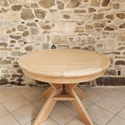 Round table in the style of Pierre Chapo.