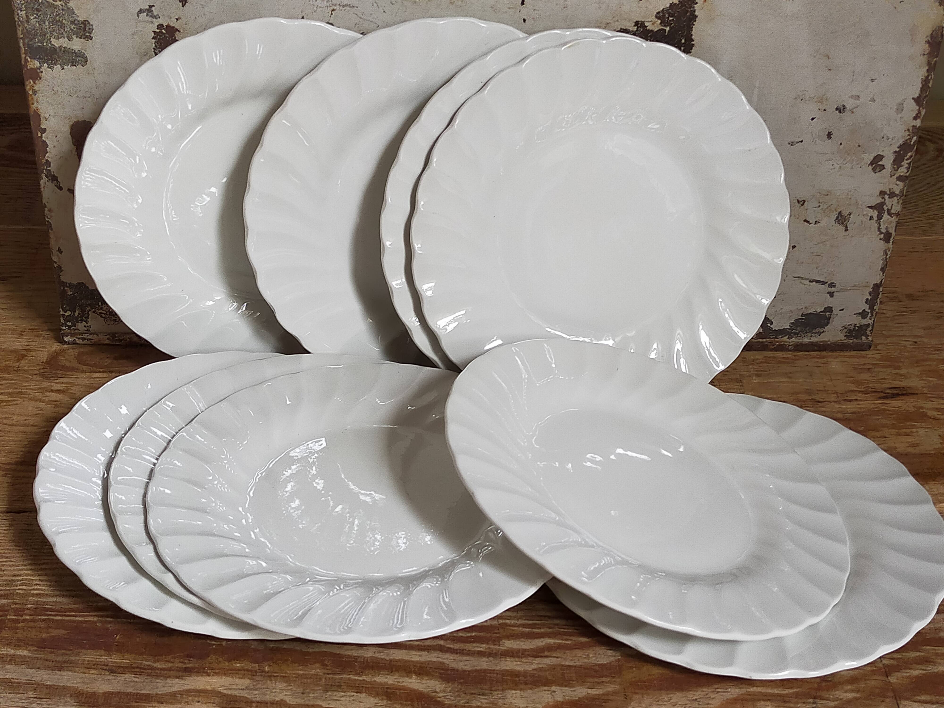 Nine fine English porcelain sweet plates