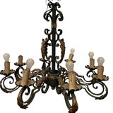 Louis XV style chandelier in wrought and hammered iron 20th century