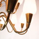 Lamp with arms of brass and glass, of Danish design from the 1950s